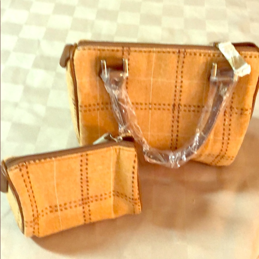 Light brown purse with makeup bag